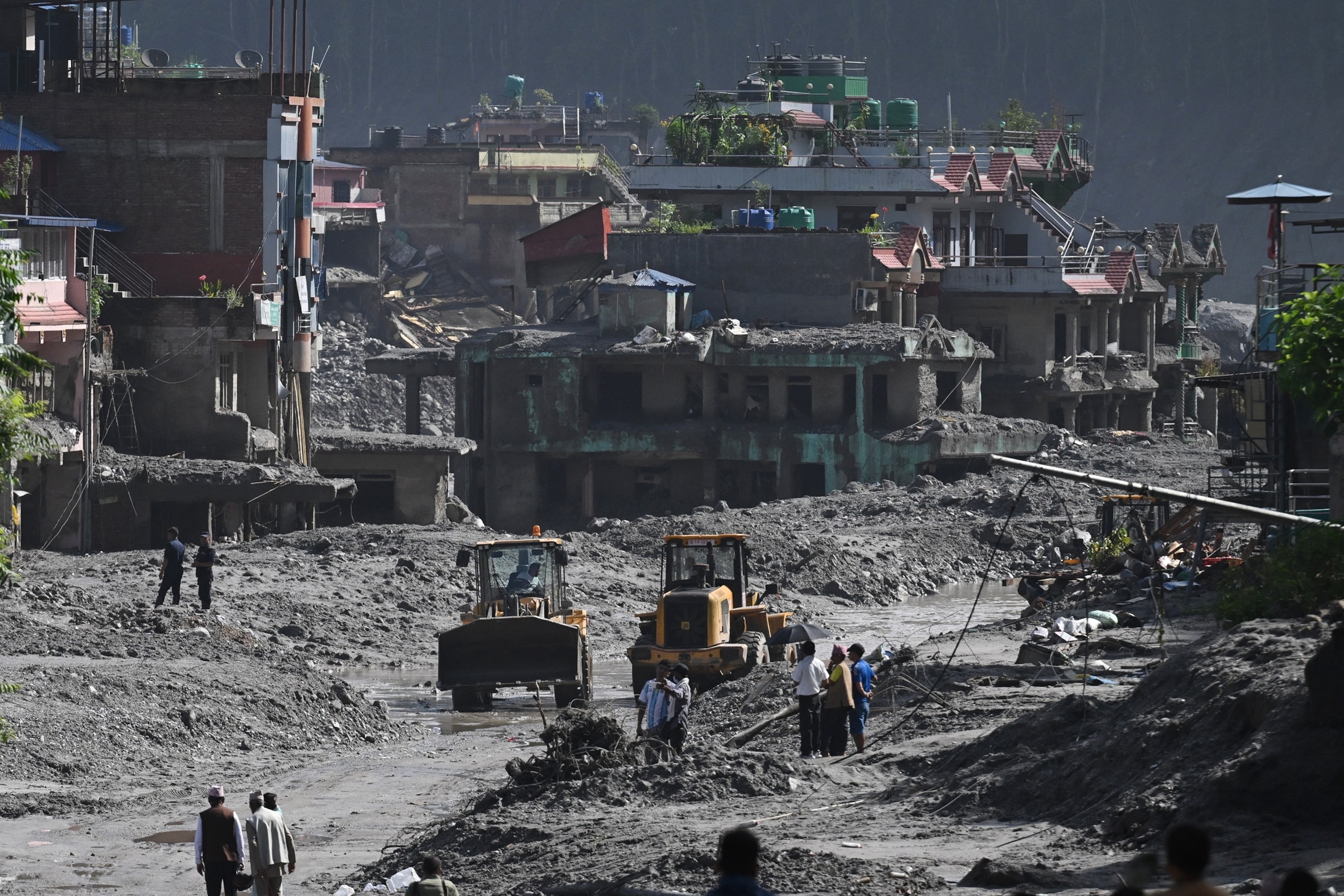 Rescue works continue at Trishuli Center in Nepal's Nuwakot district on Aug. 30, 2026.Arun Sankar/AFP via Getty Images