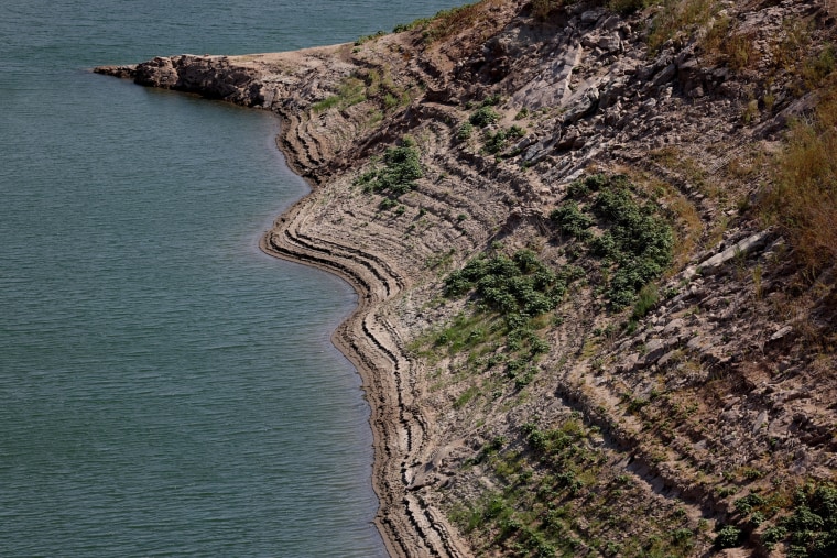 Lines show previous water levels at Lake Mead on Aug. 12.Ian Maule / Bloomberg via Getty Images
