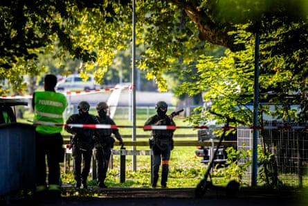 Police secure the area around the Schachen racing track after the shooting.Photograph: Michael Buholzer/Keystone/AP