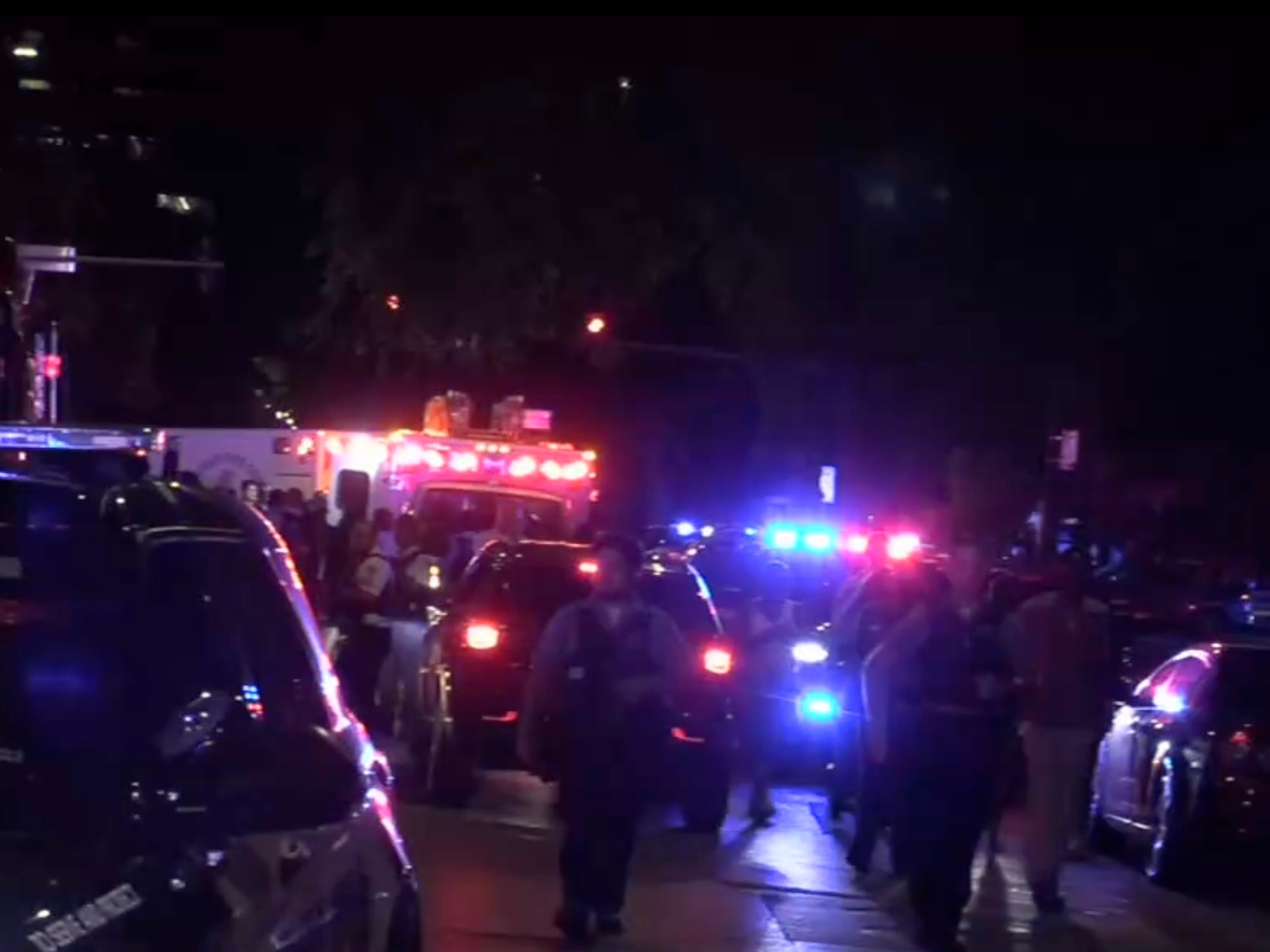 Police officers and ambulance crews respond, August 29, 2026, to a mass shooting in Chicago's Washington Park that left one person dead and nine injured, authorities said.WLS