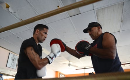 Anthony Mundine spars with Tony during a training session at his gymnasium in Redfern in 2013.Photograph: AAP