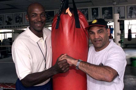 NBA star Clyde Drexler with Tony Mundine during a basketball clinic for the Aboriginal community at Mundine’s gym in Redfern.Photograph: Tim Cole/AAP