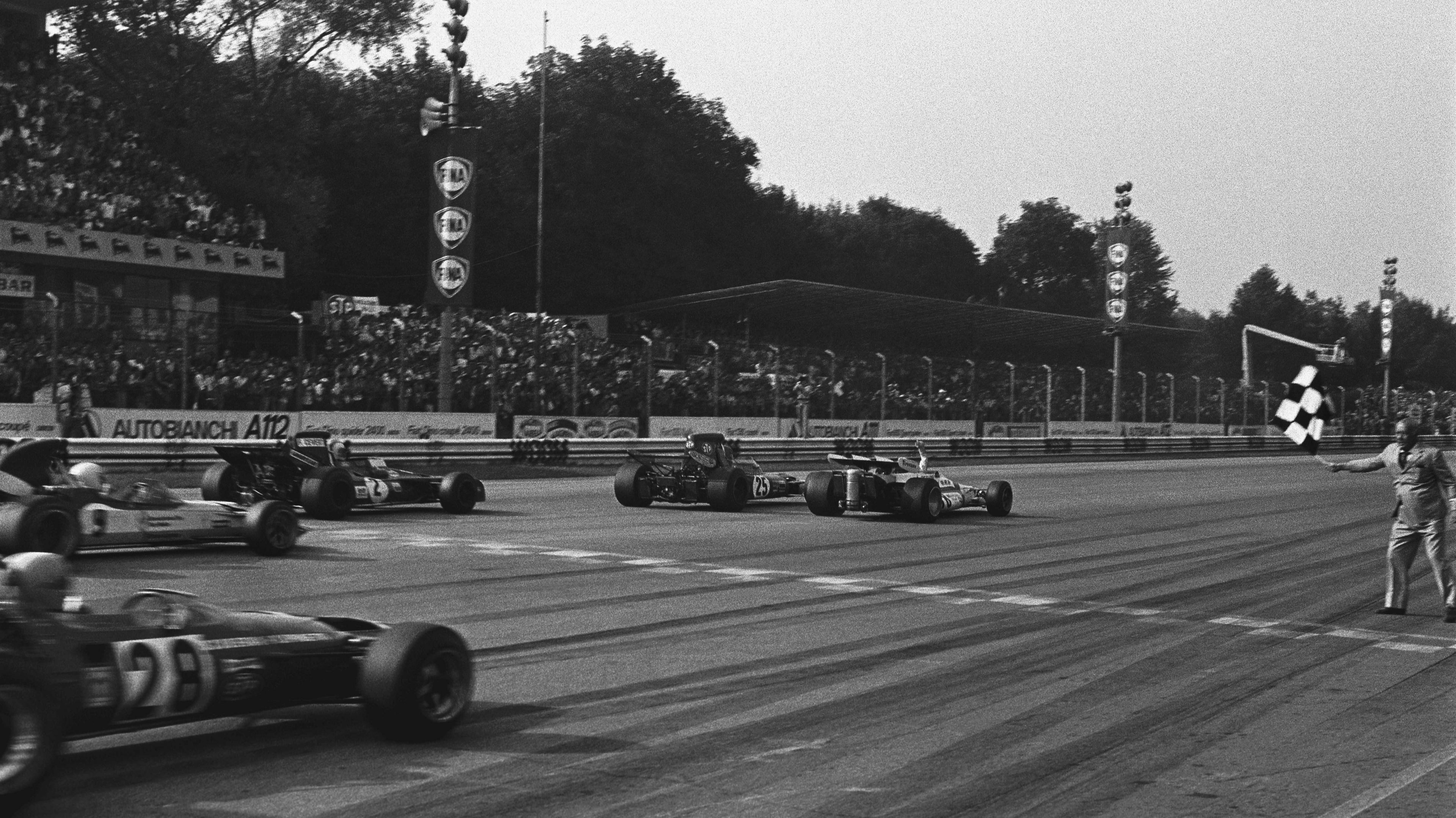 Image caption,Another thrilling finish as BRM's Peter Gethin crosses the line to win in 1971, just ahead of March's Ronnie Peterson, Tyrrell's Francois Cevert, Mike Hailwood in a Surtees and BRM's Howden Ganley. There was just six tenths of a second between the top five.