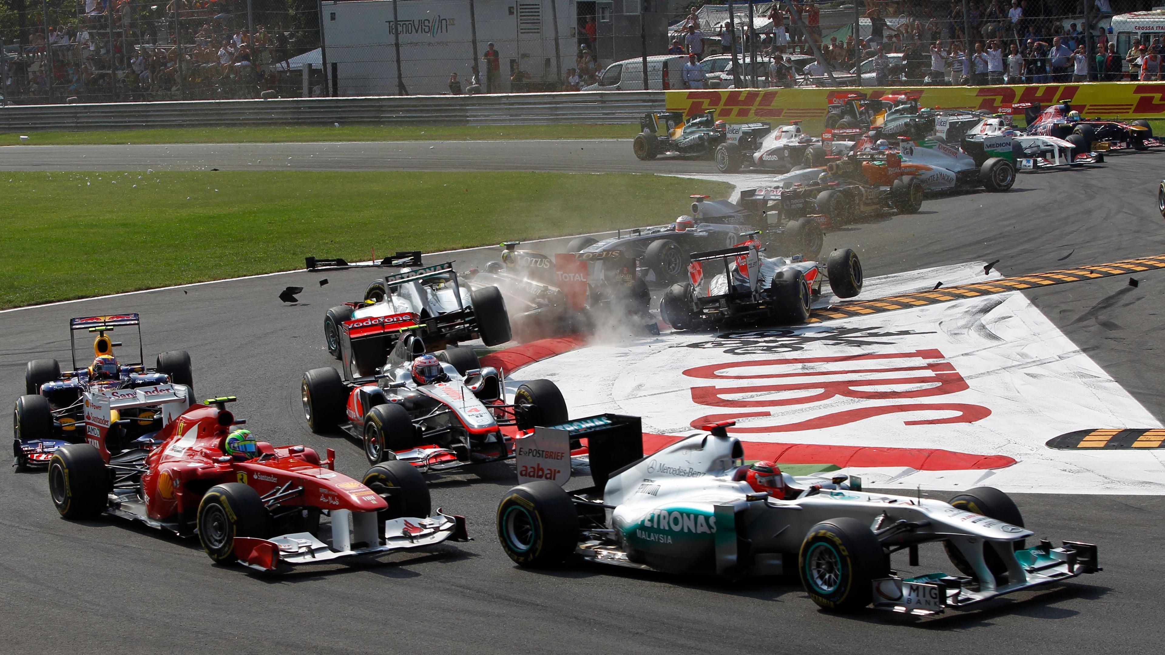 Image caption,The first chicane is frequently the scene of contact and cars going off track as drivers jostle for position. Many are facing in unorthodox directions here at the start in 2011.
