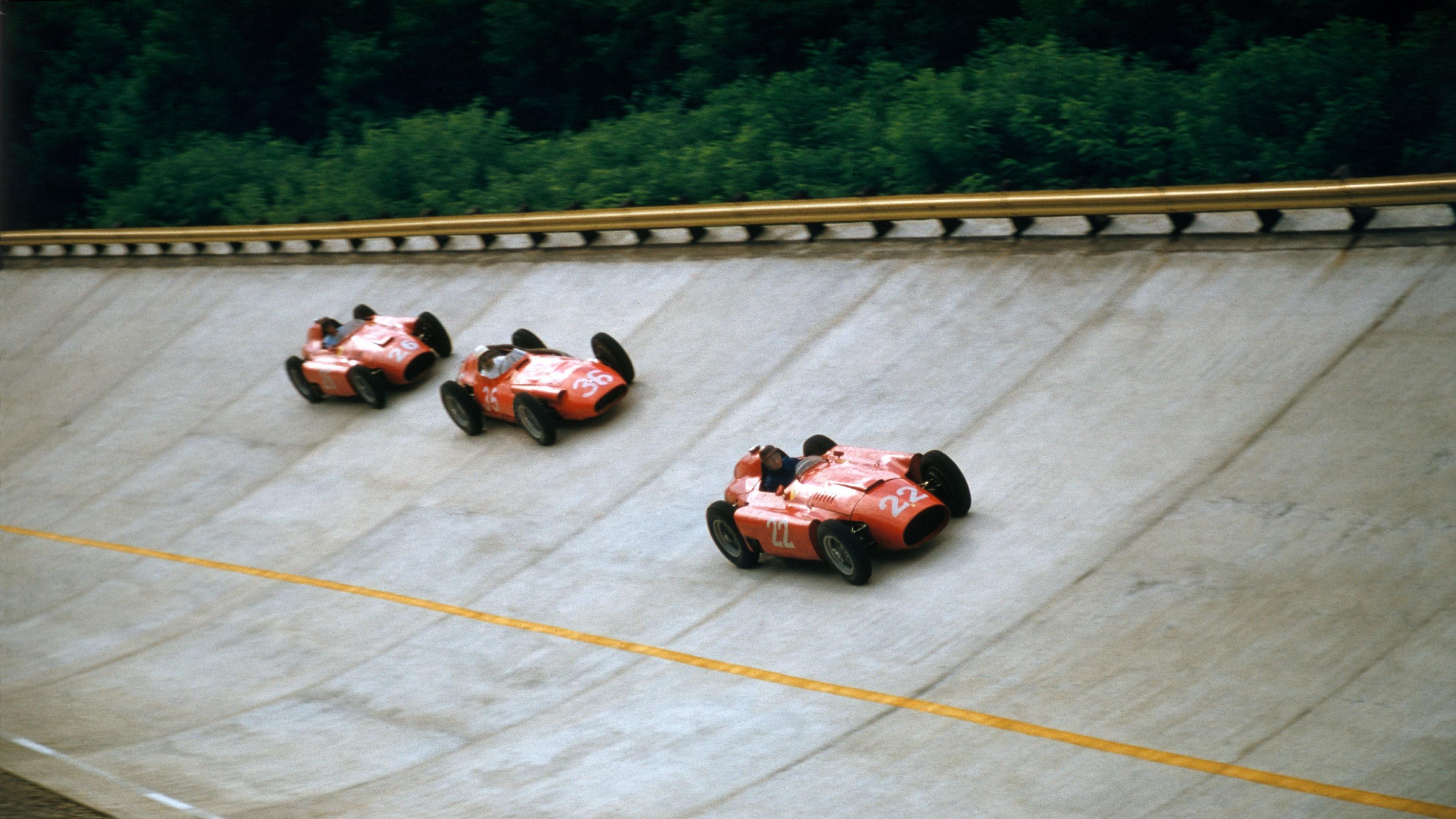 Image caption,Juan Manuel Fangio is followed by Stirling Moss and Peter Collins on the steep banking during the 1956 Italian Grand Prix. The banking was used up until the 1961 race and remains in place at Monza. Maserati's Moss won the race. Ferrari pair Fangio and Collins shared second place, after the Briton handed over his car to his Argentine team-mate. The points ensured Fangio won the fourth of his five world titles.
