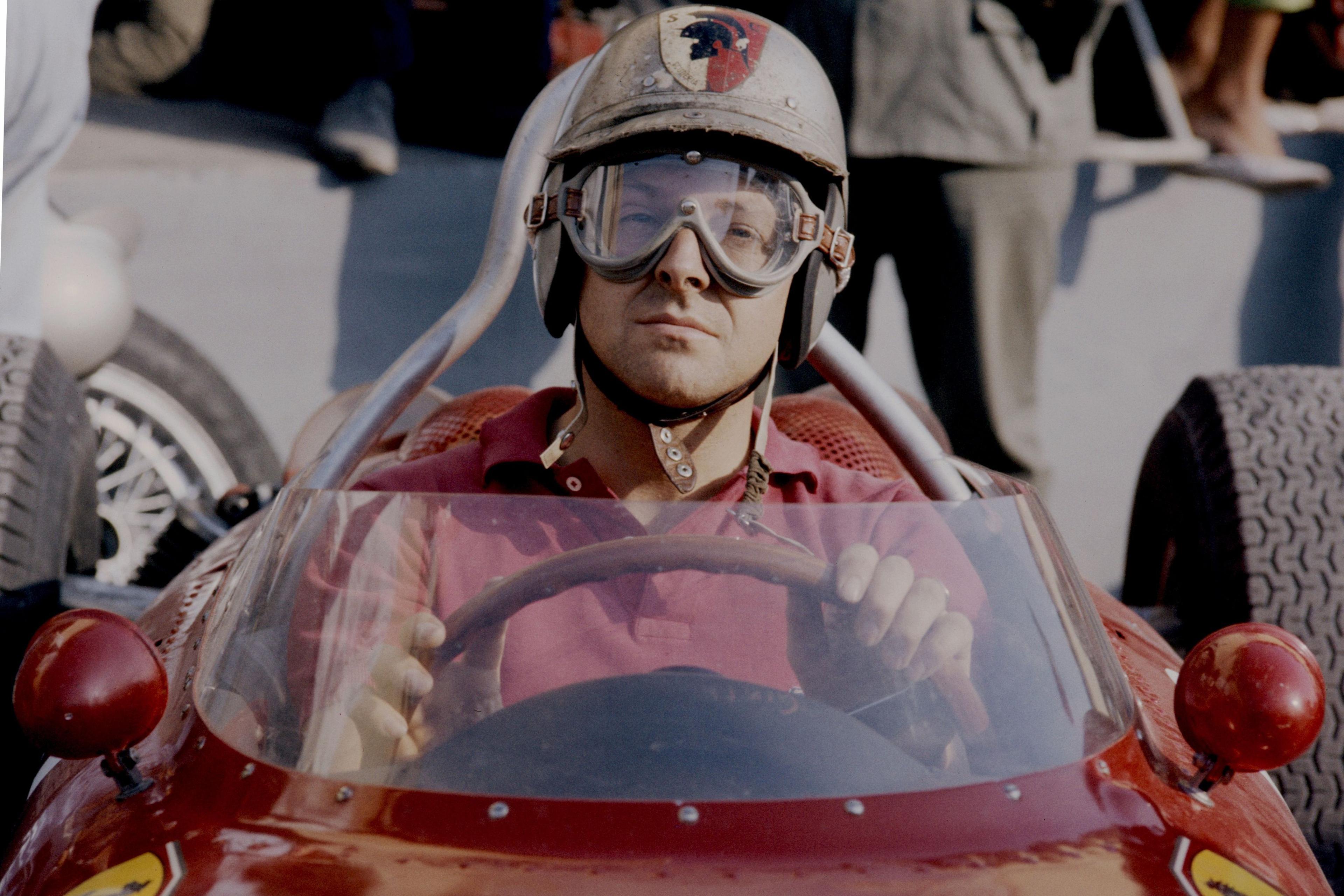 Image caption,Ferrari's Wolfgang von Trips was on the verge of winning the world championship when he collided with Jim Clark's Lotus on the second lap of the 1961 race. His car flew into a crowd of people on an embankment, killing him and 14 others. The German is pictured before that fateful race.