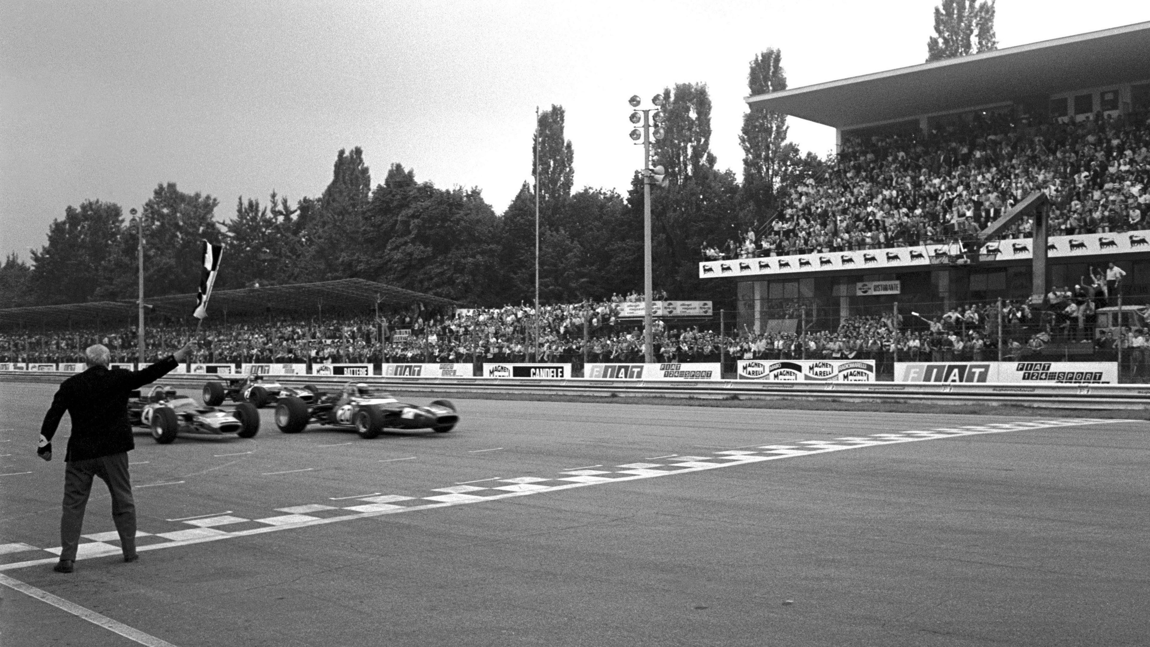 Image caption,Before chicanes were installed, Monza's layout ensured races were a battle of slipstreaming with regular changes of position. Here, in 1969, Matra's Jackie Stewart crosses the line to win just ahead of Jochen Rindt's Lotus, Matra's Jean-Pierre Beltoise and Bruce McLaren, representing his own team. The top four were separated by less than two tenths of a second.