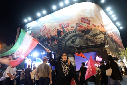 Iran’s leaders have appealed to the public’s sense of patriotism as they try to weather the country’s economic downturn.Photograph: Abedin Taherkenareh/EPA