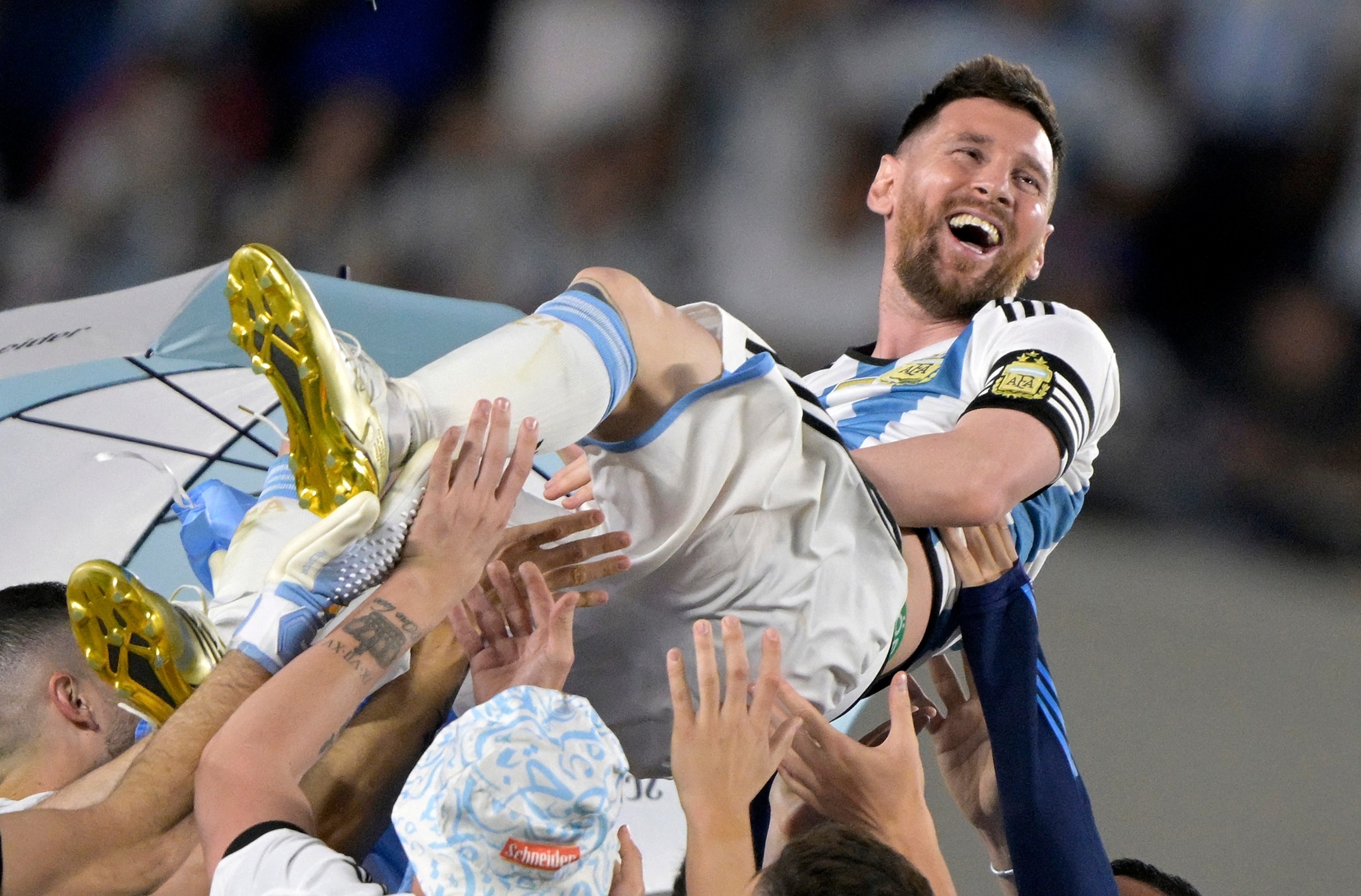 Argentina's forward Lionel Messi is thrown up in the air by teammates following the friendly football match between Argentina and Panama at the Monumental stadium in Buenos Aires on March 23, 2023.Juan Mabromata/AFP via Getty Images
