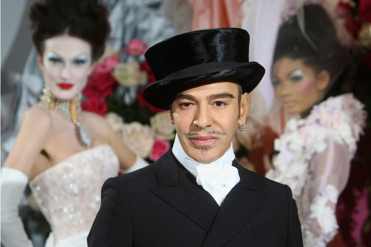 Galliano poses at the end of the presentation of the Dior Haute Couture spring/summer 2010 fashion collection in Paris.Jacques Brinon / AP file