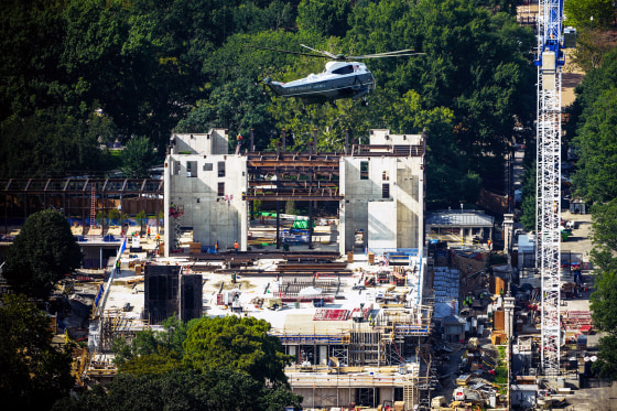 Marine One with President Donald Trump passes over construction on the new White House ballroom Friday as seen from the Washington Monument.Julia Demaree Nikhinson / AP