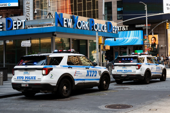 NYPD officers reportedly shoot a knife-wielding woman who is accused of stabbing two people near Times Square on Monday.Kyle Mazza / Sipa USA via AP