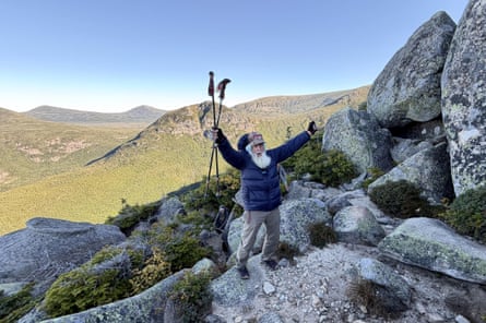 Dale Sanders celebrates after completing a difficult section of Mt Katahdin in Baxter state park in Piscataquis county, Maine.Photograph: Robert F Bukaty/AP