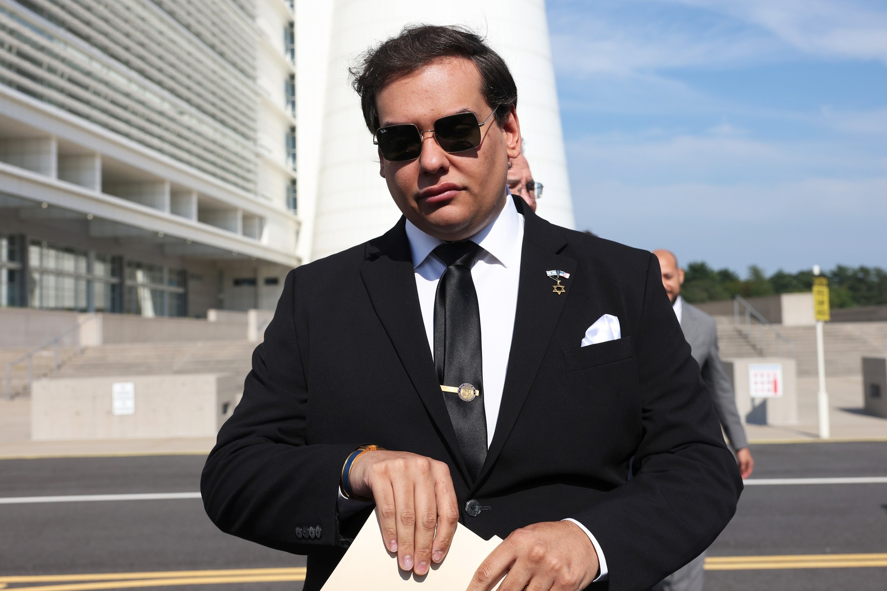 Former Rep. George Santos prepares to give a statement after a court hearing on August 19, 2024 in West Islip, New York.Michael M. Santiago/Getty Images