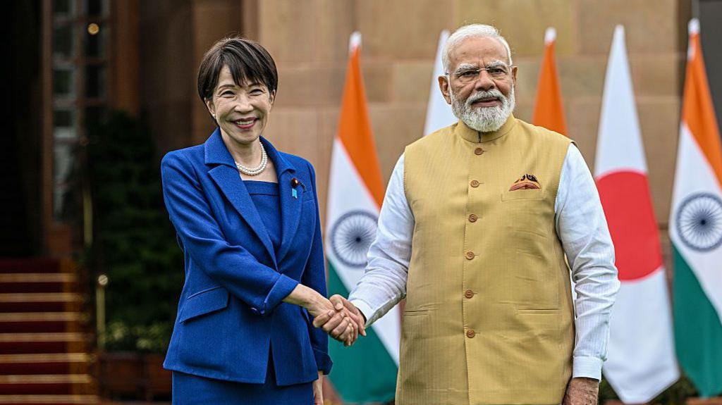 Image caption,Japanese companies announced $12.5bn in investments in India through some 120 agreements during PM Sanae Takaichi's visit in July