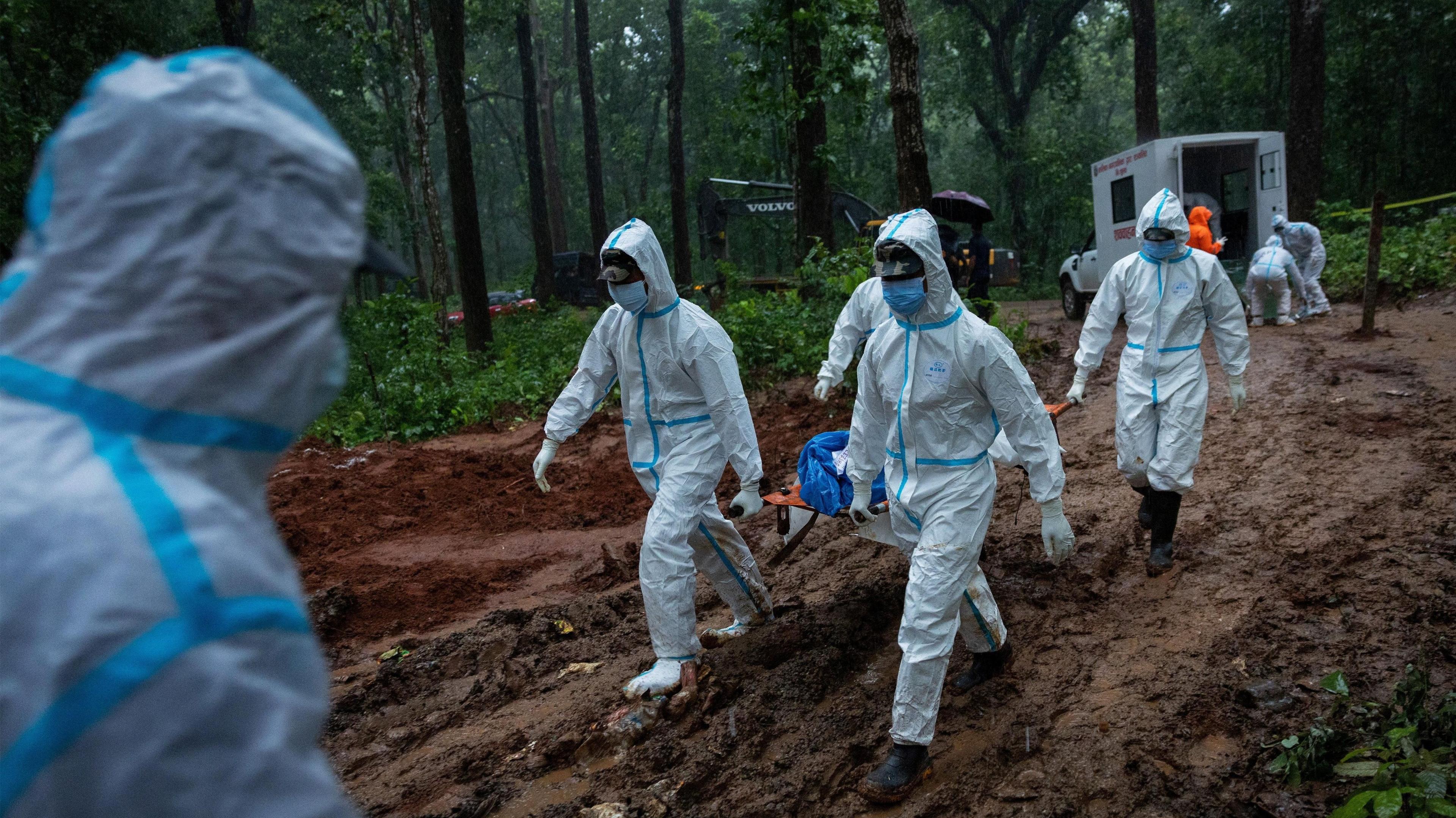 Image caption,Authorities in Chitwan have resorted to burying unidentified bodies