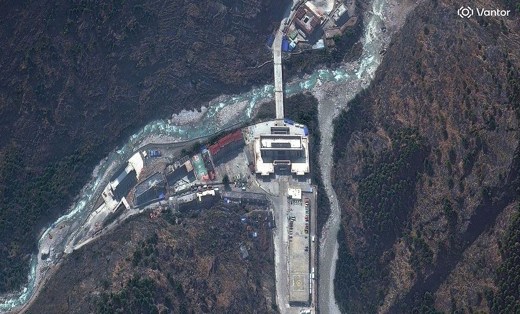 Image caption,A satellite image shows the area around the Nepal-China border before devastating floods swept away buildings and vehicles