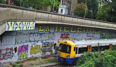 Trackside graffiti in Shepherd’s Bush, west London featuring Helch, 2020.Photograph: Mark Charnock/Alamy