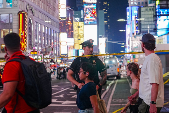 New York Police Department officers investigate the scene in Times Square on Aug. 31, 2026.Selcuk Acar / Anadolu via Getty Images