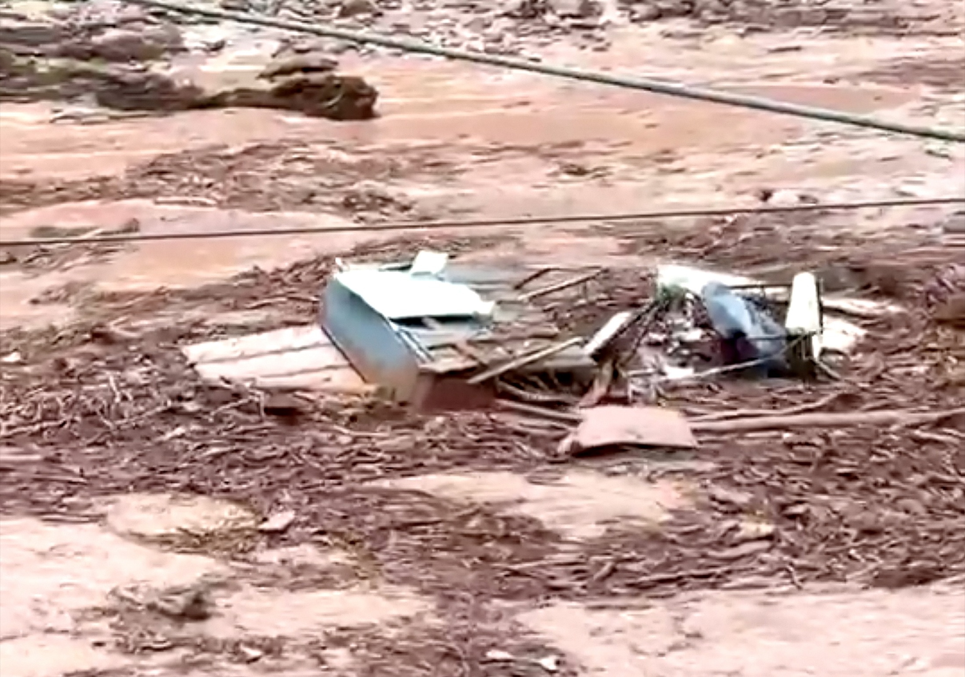 Debris, including structures, are seen being swept away in a creek at the Grand Canyon, August 29, 2026.Erica Viola