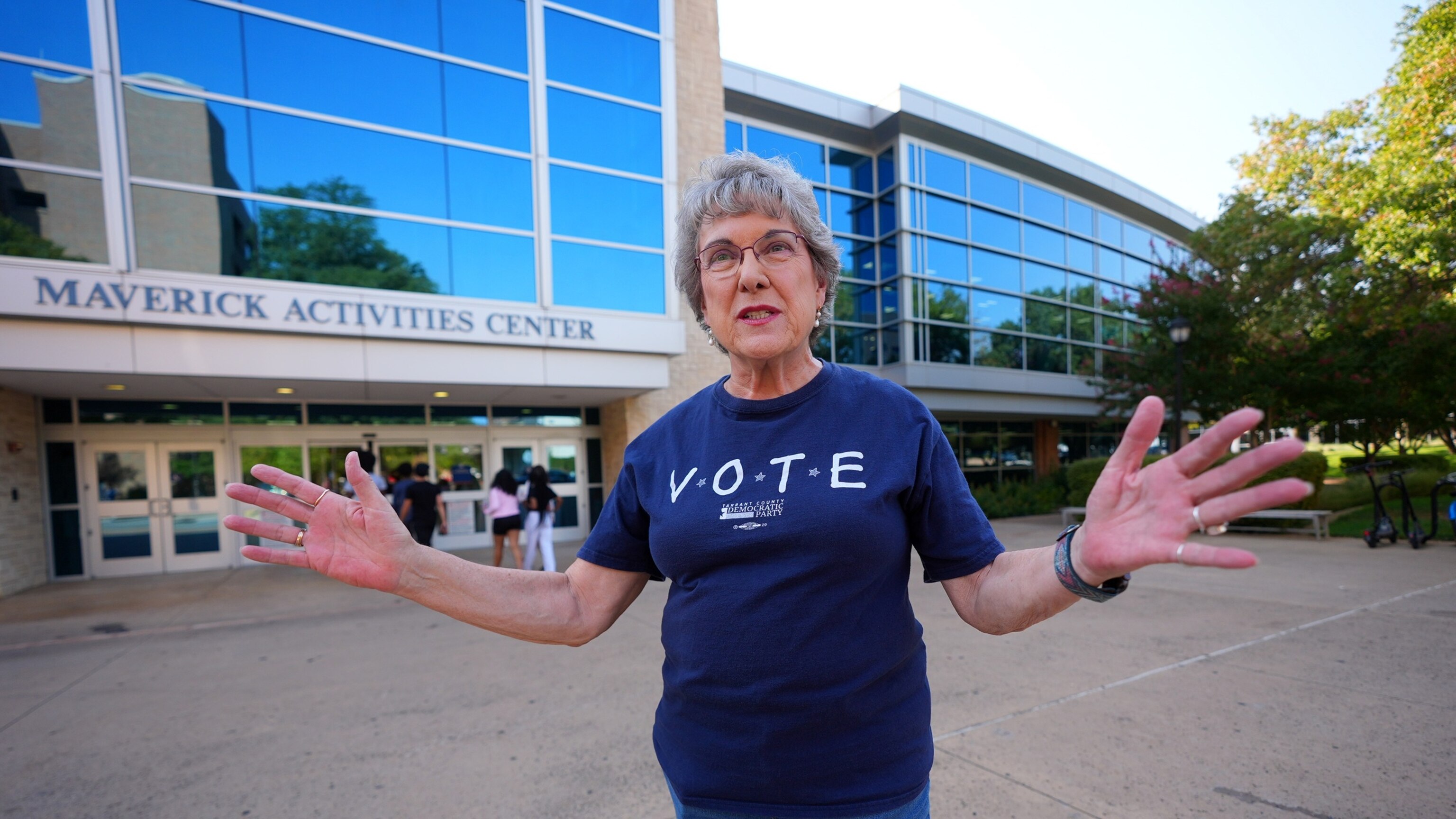 Tarrant County election judge Carol Radburn talks in front of a UTA campus voting site proposed to be closed for upcoming elections in Arlington, Texas, on Aug. 26, 2026.LM Otero/AP Photo