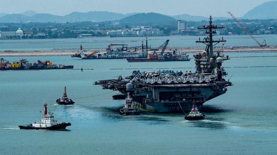 Image caption,US personnel arriving at the Hard Rock Hotel in Pattaya on Wednesday