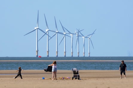 The wind turbines of the Burbo Bank windfarm in Liverpool Bay, off New Brighton beach.Photograph: Christopher Furlong/Getty Images