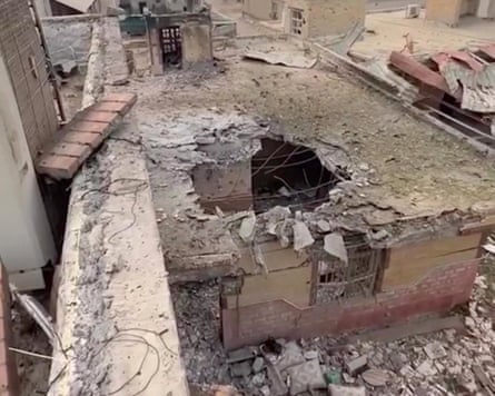Footage of the aftermath of the strike shows a caved-in roof, blown-out windows and ground riddled with debris.Photograph: Iranian Red Crescent/AFP/Getty Images