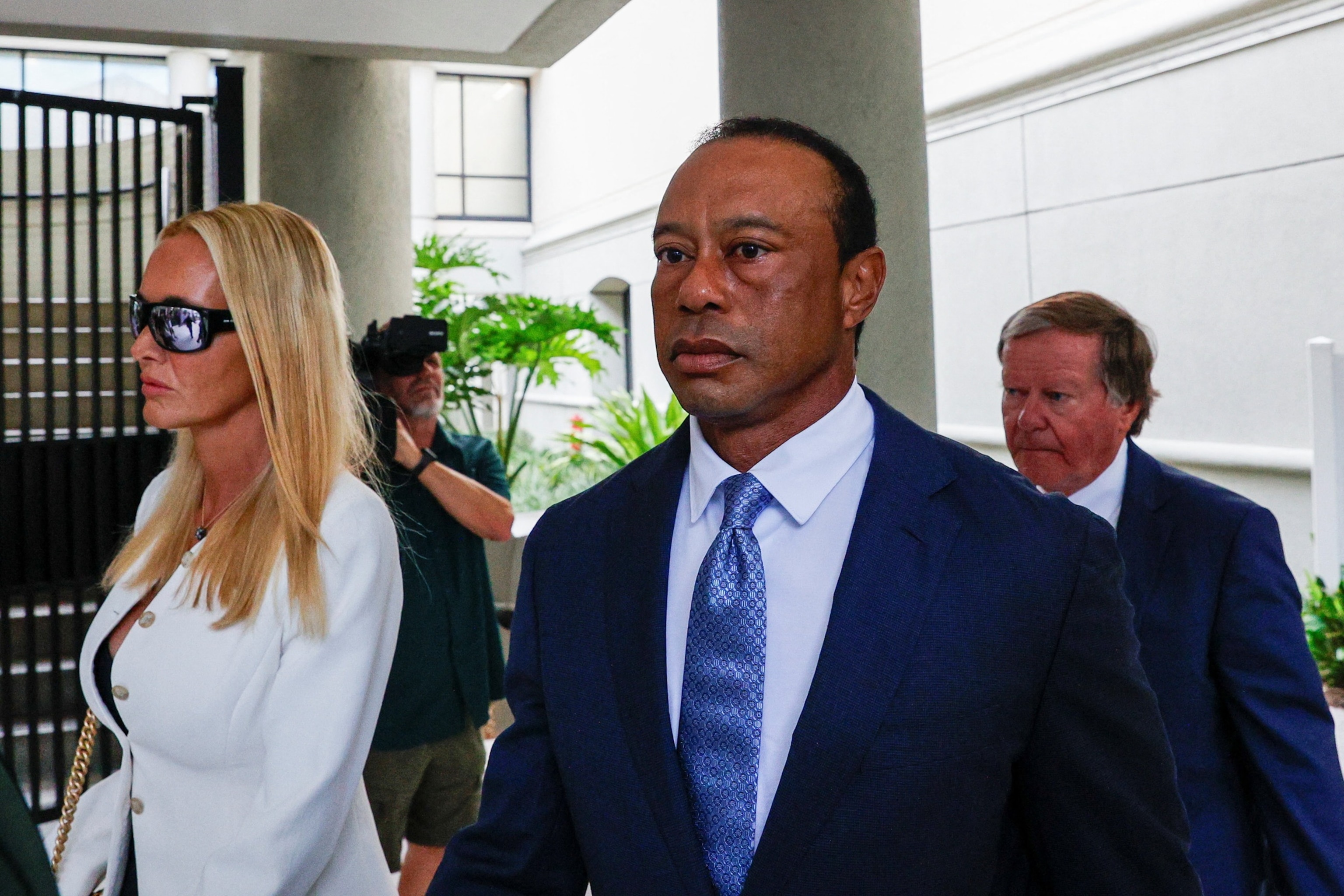 Golfer Tiger Woods leaves the courthouse with Vanessa Trump after his scheduled appearance before a judge in Stuart, Florida, September 2, 2026.Marco Bello/Reuters