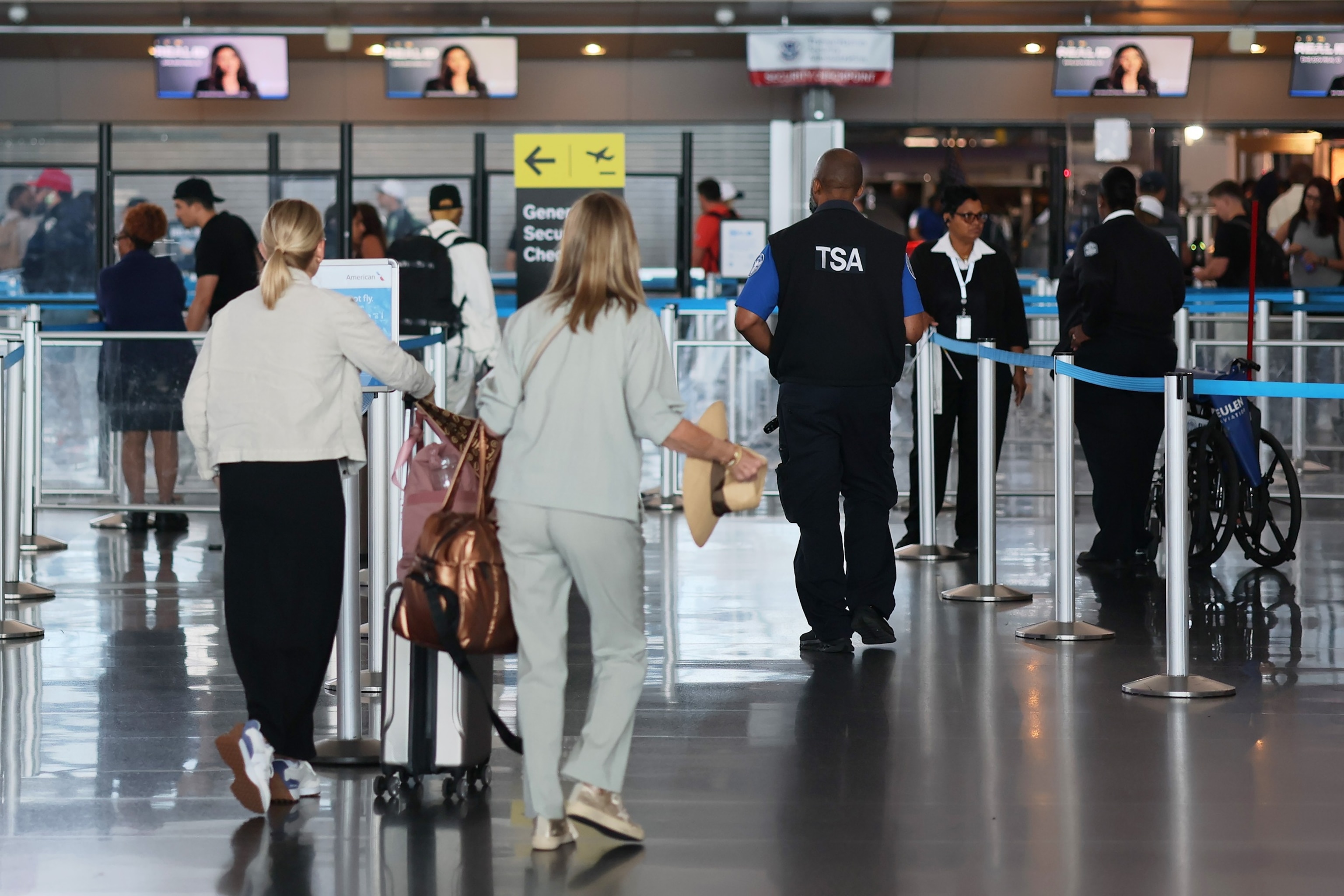 eople walk through Terminal 8 at JFK Airport, Aug. 29, 2025, in New York.Michael M. Santiago/Getty Images