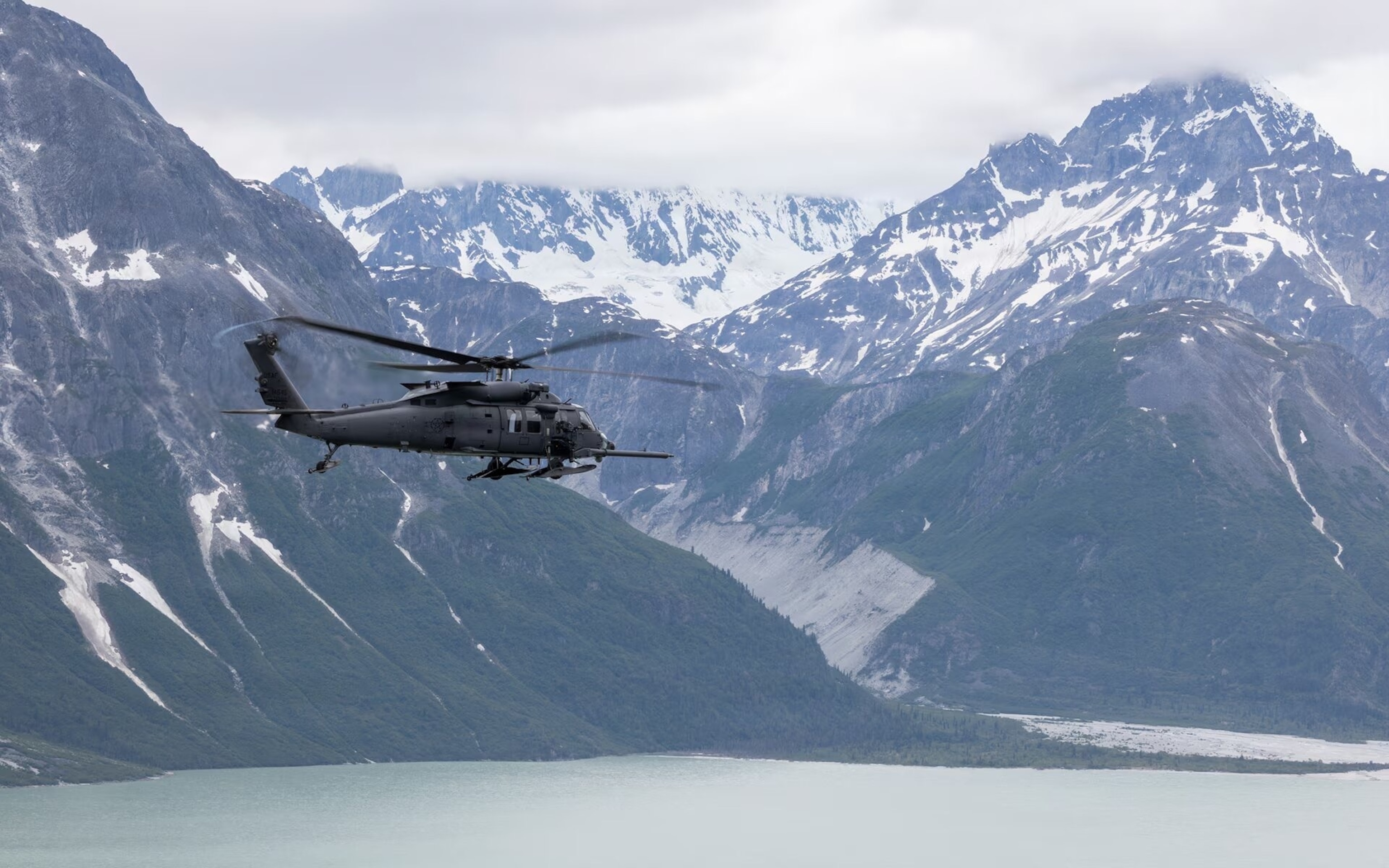 An Alaska Air National Guard HH-60W Jolly Green II, assigned to the 210th Rescue Squadron, 176th Wing, flies over Southcentral Alaska during a training mission on July 8, 2026.Alejandro Pena via Alaska Air National Guard