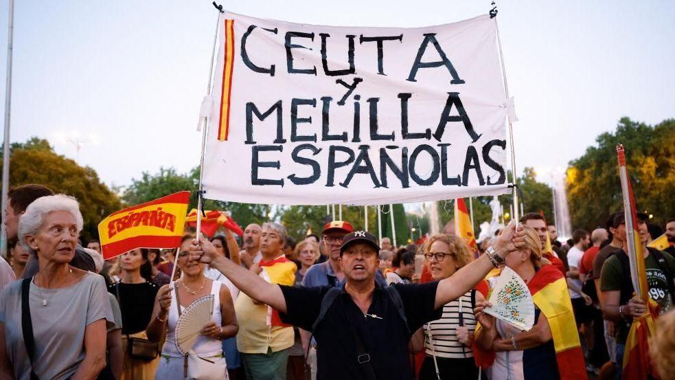 Image caption,Spaniards took to the streets in a number of cities to mark Ceuta Day