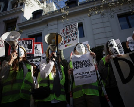 Protesters marched to the gates of the $12m residence Peter Thiel bought when he moved his family to Argentina in April.Photograph: Tomás Cuesta/Reuters