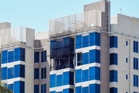 Damage to a residential building after an Iranian drone attack, according to Kuwaiti authorities, in Kuwait City on Thursday.Photograph: AFP/Getty Images