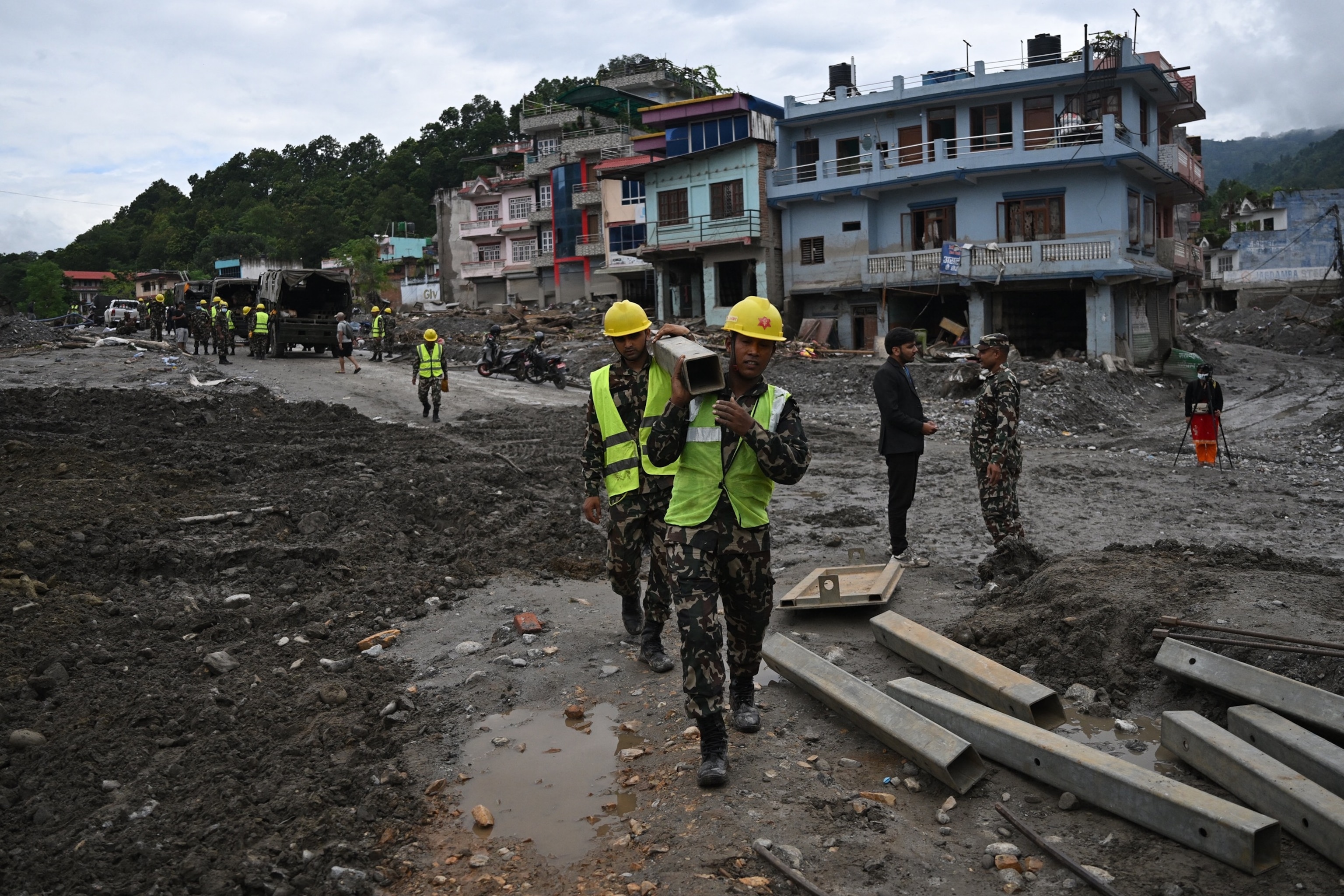 Nepal army personnel prepare to construct a bridge across Trishuli river at Devighat in Nepal's Nuwakot district on Sept. 3, 2026.Arun Sankar/AFP via Getty Images