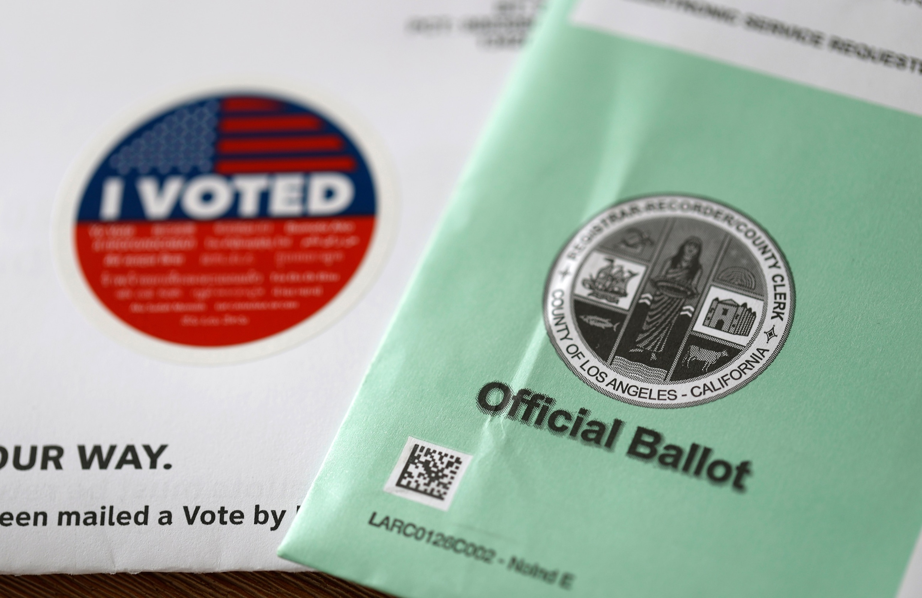 In this June 2, 2026, file photo, an election ballot and 'I Voted' sticker are displayed in Los Angeles.Justin Sullivan/Getty Images, FILE