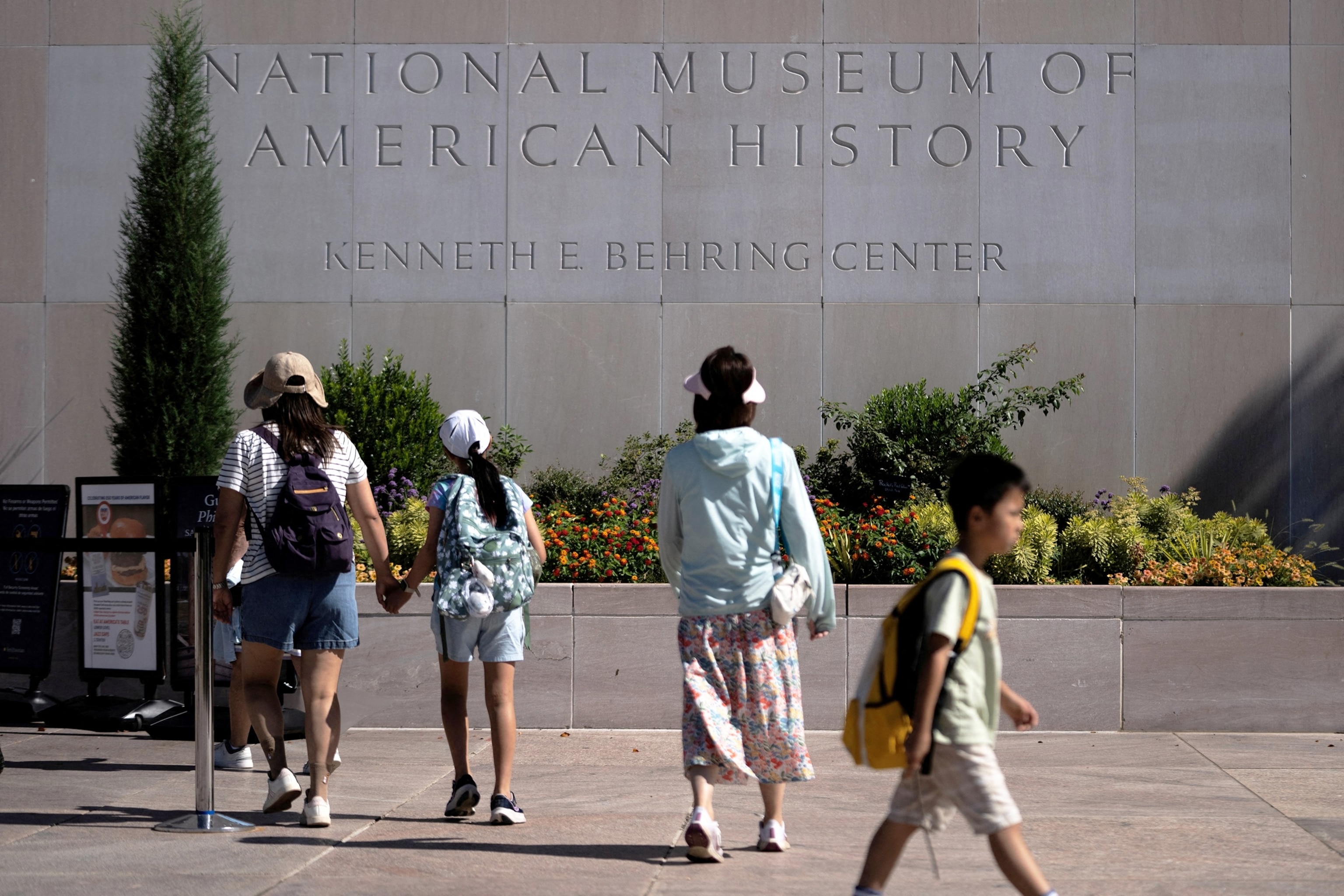 In this July 30, 2026, file photo, visitors arrive at the Smithsonian National Museum of American History in Washington, D.C.Nathan Howard/Reuters, FILE