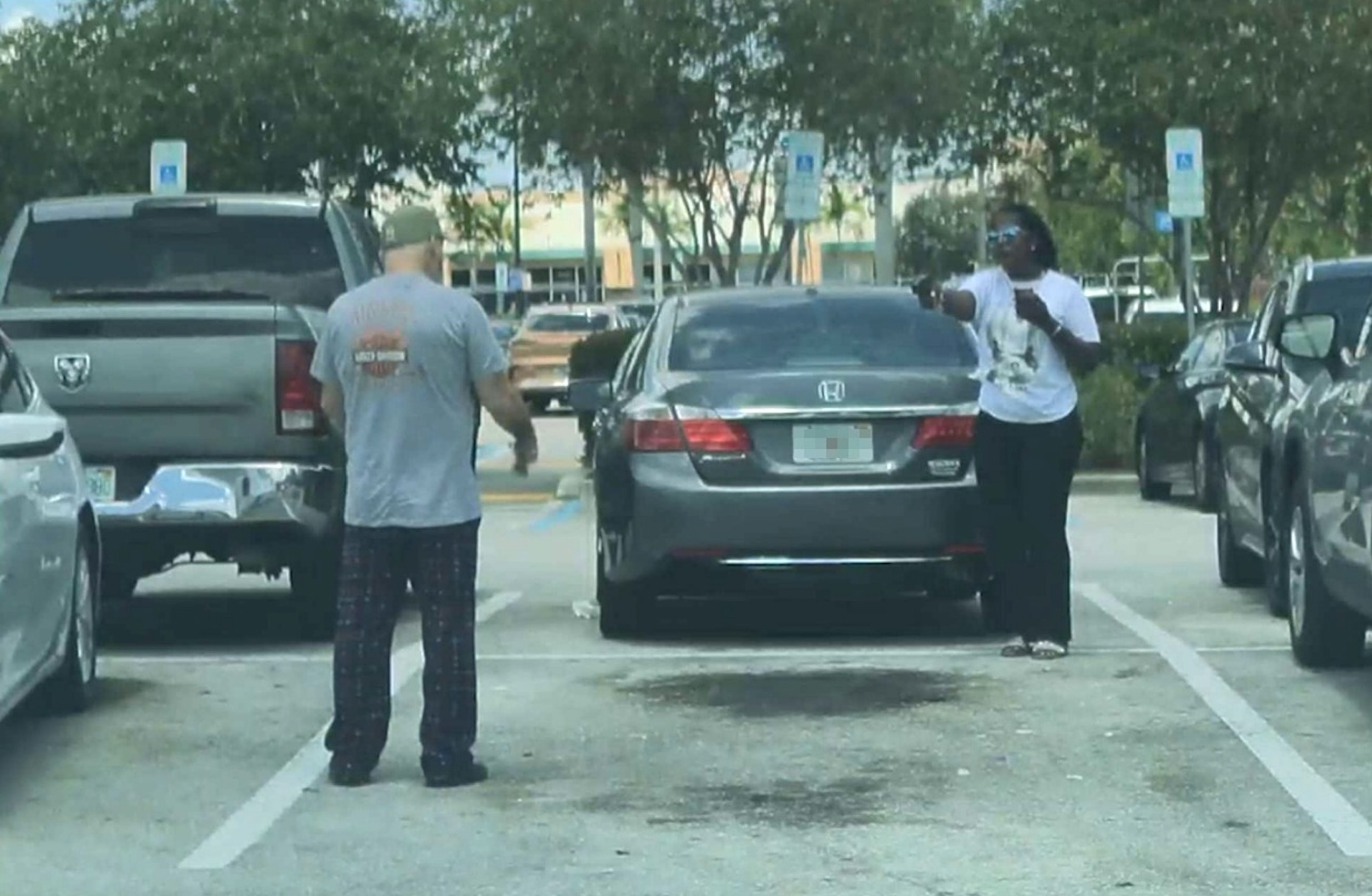 A still included in the Broward County State Attorney's Office memo on a shooting in a Walmart parking lot in North Lauderdale, Florida, June 30, 2026.Broward County State Attorney's Office
