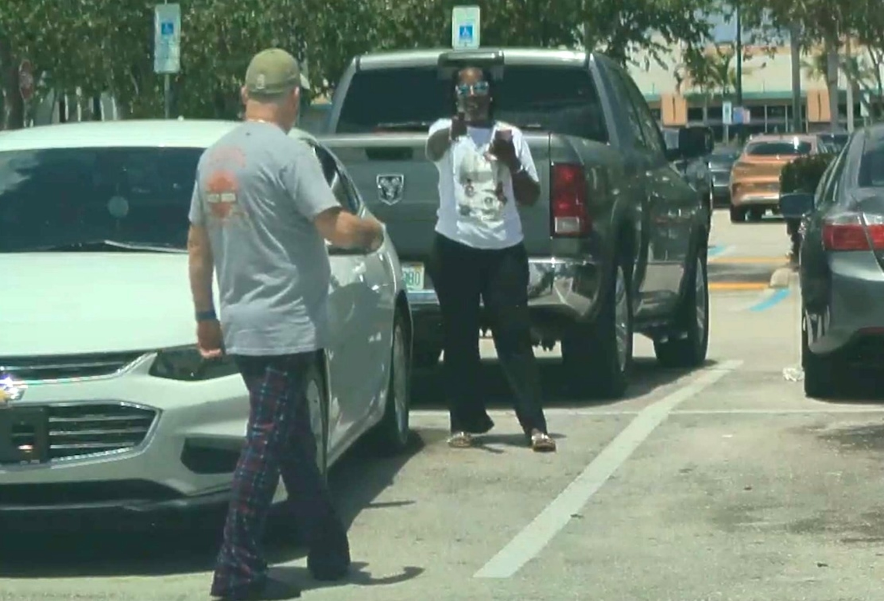 A still included in the Broward County State Attorney's Office memo on a shooting in a Walmart parking lot in North Lauderdale, Florida, June 30, 2026.Broward County State Attorney's Office