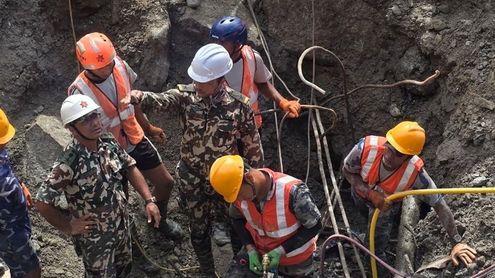 Soldiers rescue a worker alive from a tunnel during an ongoing operation at the Trishuli-3A hydropower project in Nepal's Rasuwa district, Sept. 4, 2026.Nepal Army