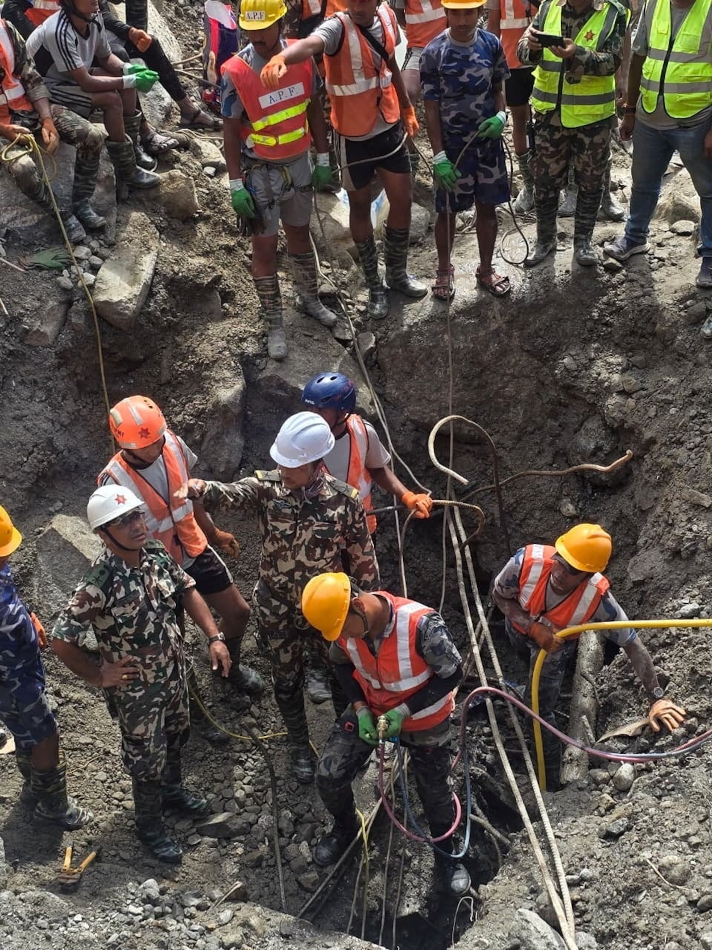 Soldiers rescue a worker alive from a tunnel during an ongoing operation at the Trishuli-3A hydropower project in Nepal's Rasuwa district, Sept. 4, 2026.Nepal Army