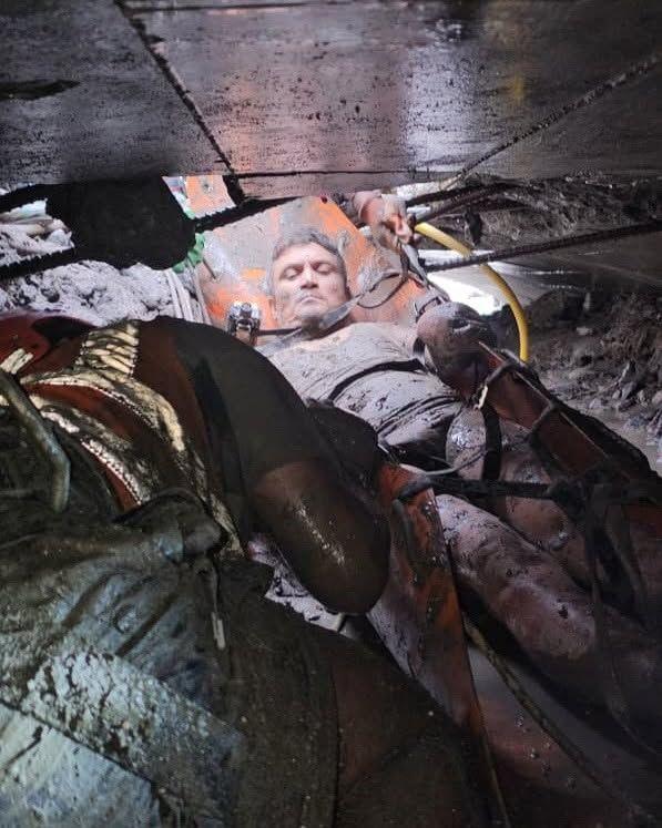 Image caption,Rescuers had to pull the survivors through a tiny passageway created at the top of the rubble in the tunnel