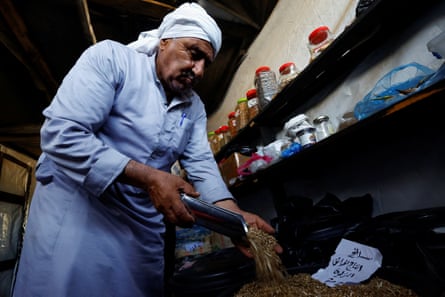 Salama Muhanna inside the seed bank: ‘During the war, they’ve been our lifeline.’Photograph: Mahmoud Issa/Reuters