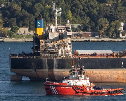 A damaged Liberian-flagged bulk carrier is escorted by a safety boat through the Bosphorus this week.Photograph: Murad Sezer/Reuters