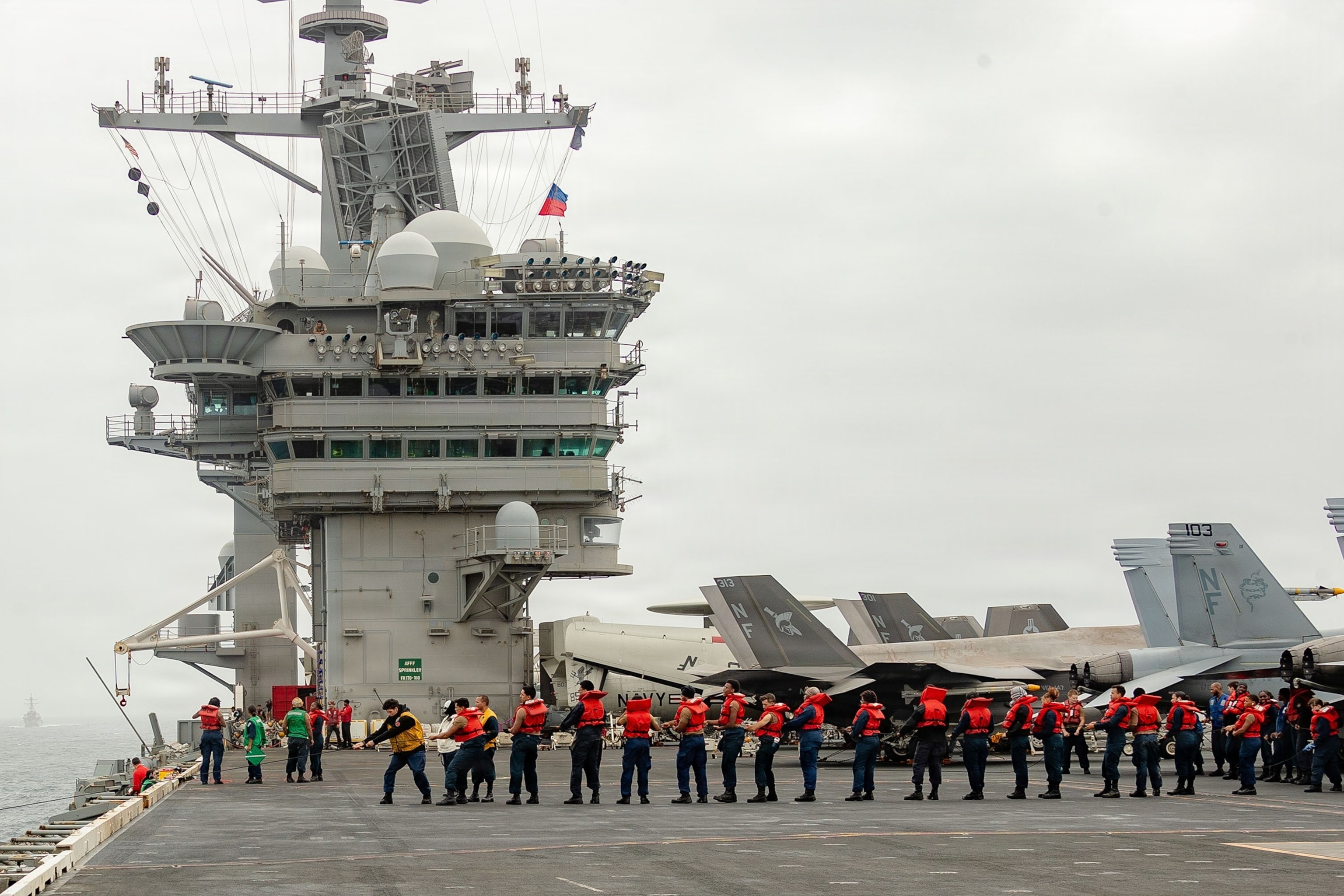 U.S. sailors maintain a phone-and-distance line aboard Nimitz-class aircraft carrier USS George Washington during a fueling-at-sea evolution with fleet replenishment oiler USNS Henry J. Kaiser, Aug. 31, 2026.US Navy