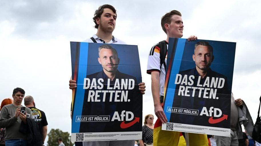 Image caption,These AfD supporters believe their party will save Germany
