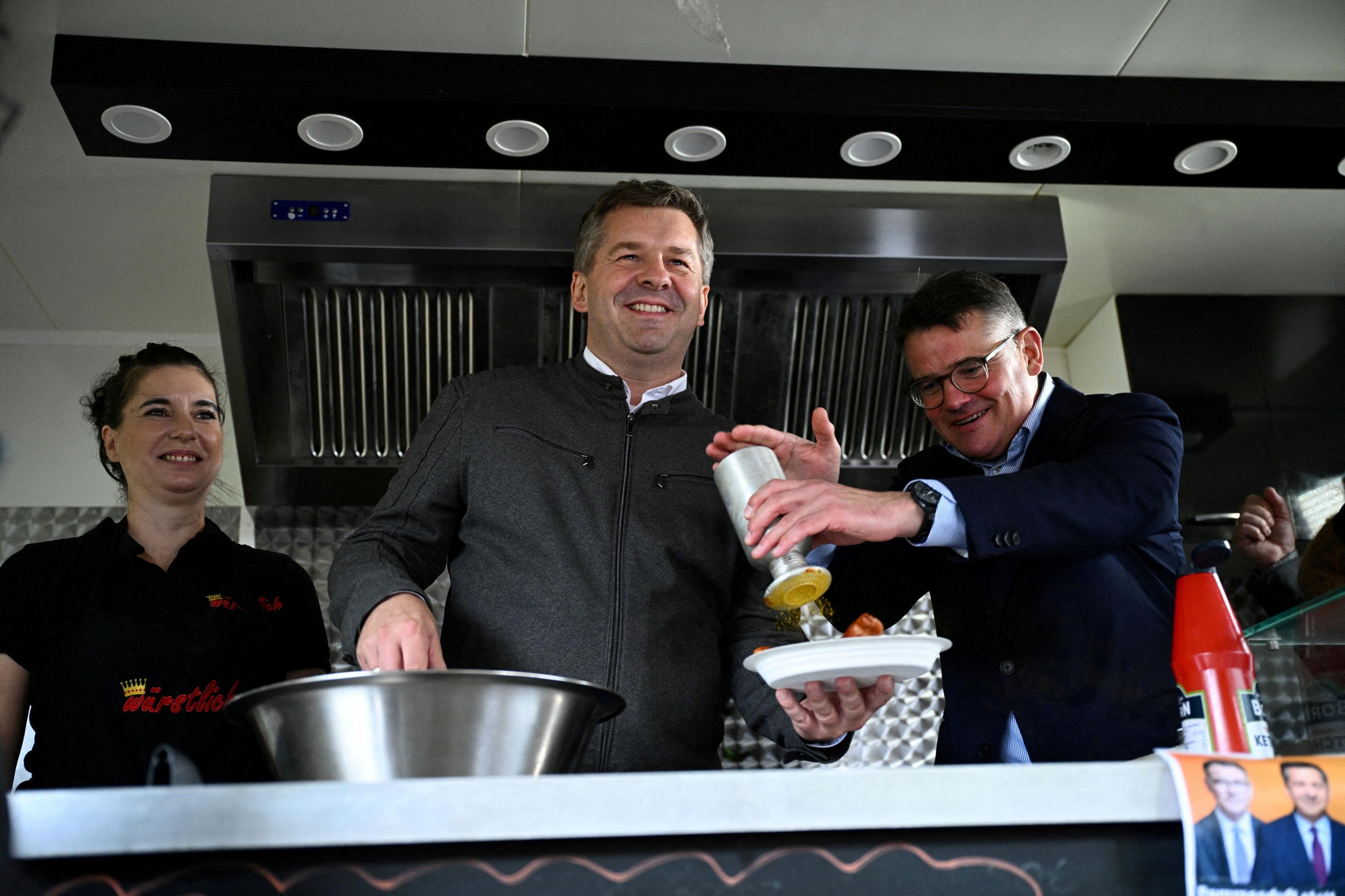 Image caption,Sven Schulze (centre) is the candidate for Merz's Christian Democrats who have ruled out working with the AfD