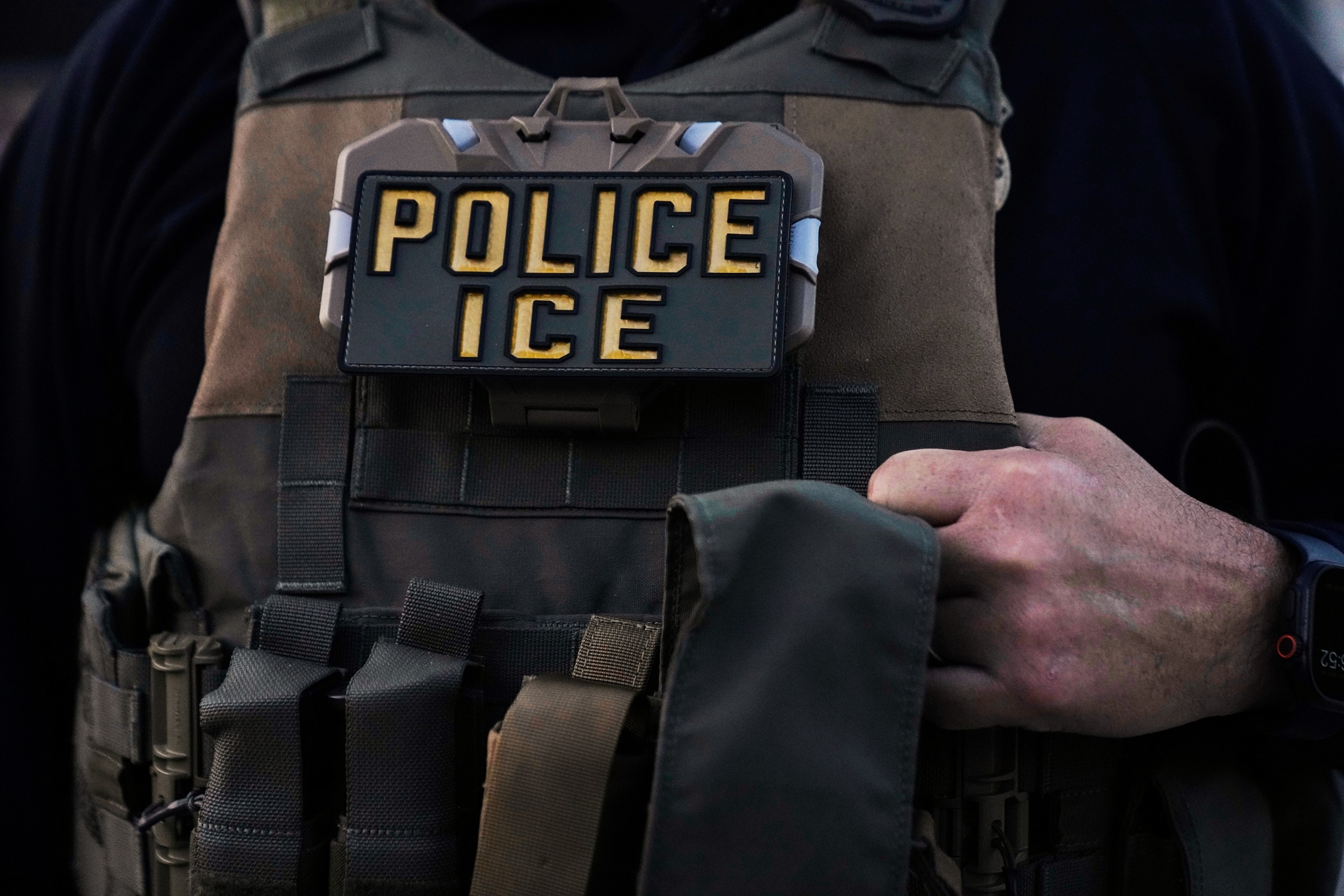A U.S. Immigration and Customs Enforcement agent is seen in Park Ridge, Ill., Sept. 19, 2025.Erin Hooley/AP, FILE