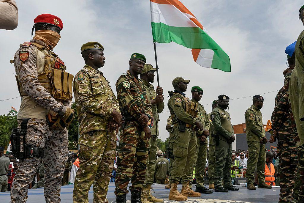 Image caption,On Wednesday, soldiers appeared at a pro-junta rally in the capital, Niamey