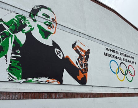 A mural of Katie Taylor at the site of her first gym.Photograph: Rory Carroll/The Guardian